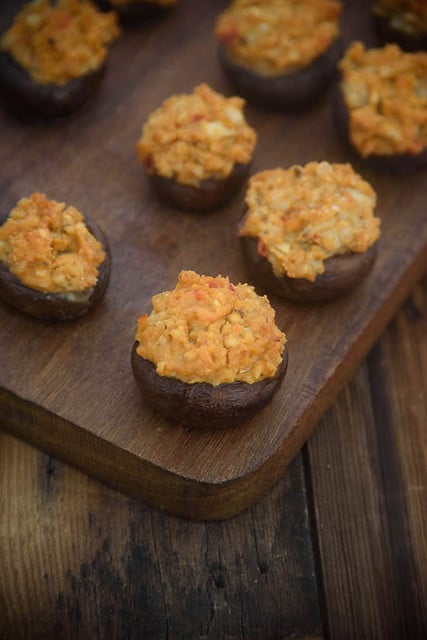 These healthy stuffed mushrooms are stuffed with hummus and are so easy to whip up with just the perfect amount of spicy! Great for game days and parties!