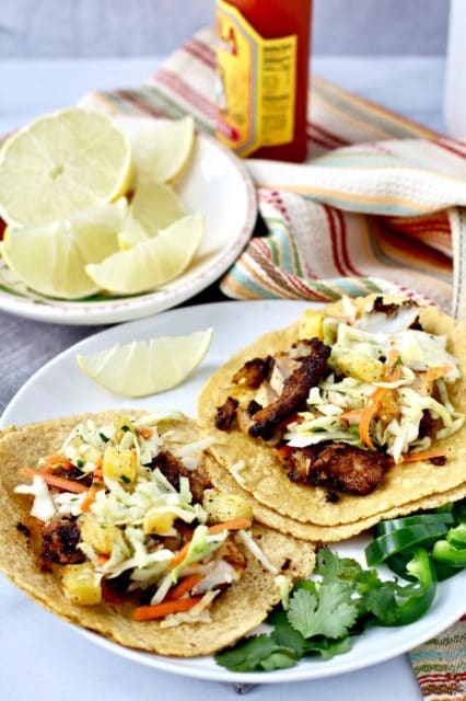 skillet charred cod tacos with roasted pineapple slaw 