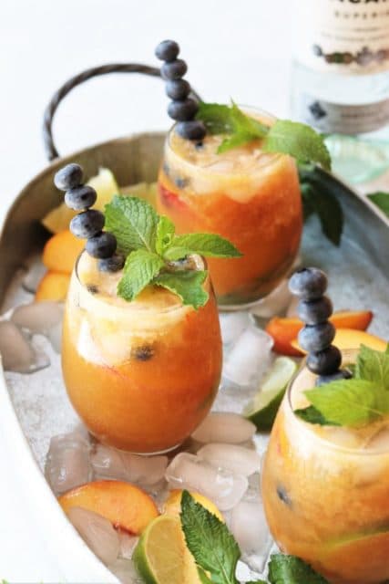 Gingered Peach and blueberry mojitos