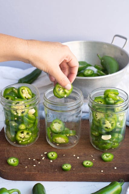 Easy homemade crunchy and sweet refrigerator pickled jalapeños recipe for your enjoyment.