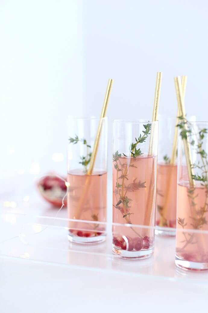 Pomegranate thyme fizz cocktail 