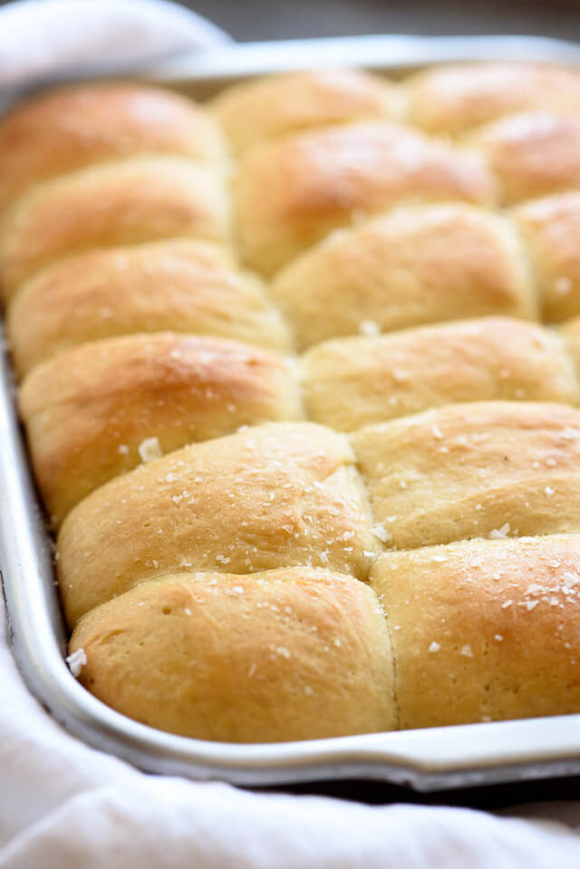 I've tried dozens of recipes and these soft honey dinner rolls are the best ones I've ever made! We sweeten them with honey and top with honey butter & salt for the perfect finish.